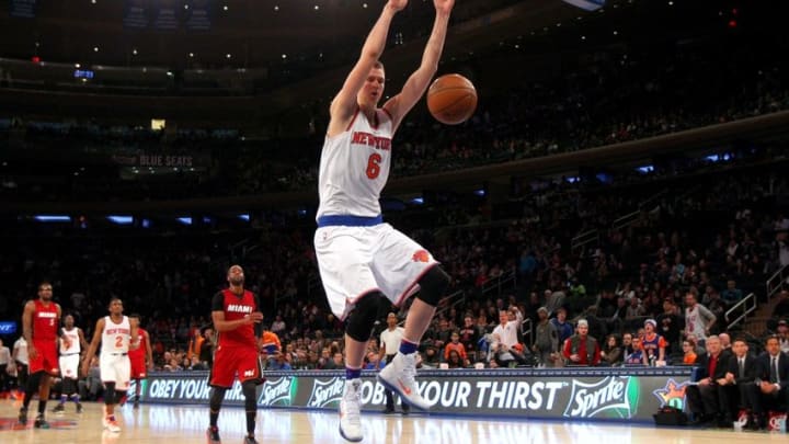 Feb 28, 2016; New York, NY, USA; New York Knicks power forward Kristaps Porzingis (6) dunks against the Miami Heat during the fourth quarter at Madison Square Garden. Mandatory Credit: Brad Penner-USA TODAY Sports