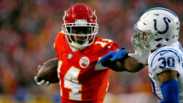 KANSAS CITY, MO – JANUARY 12: Sammy Watkins #14 of the Kansas City Chiefs stiff arms George Odum #30 of the Indianapolis Colts during the first half of the AFC Divisional Round playoff game at Arrowhead Stadium on January 12, 2019 in Kansas City, Missouri. (Photo by David Euilitt/Getty Images)