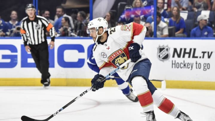 ST. PETERSBURG, FL - OCTOBER 06: Florida Panthers center Vincent Trocheck (21) carries the puck out of danger during the first period of the opening night game between the Florida Panthers and the Tampa Bay Lightning on October 06, 2018, at Amalie Arena in Tampa, FL. (Photo by Roy K. Miller/Icon Sportswire via Getty Images)