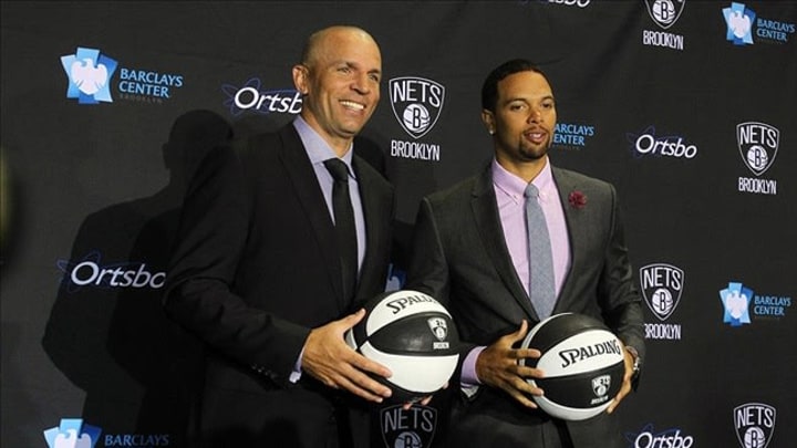 Jun 13, 2013; Brooklyn, NY, USA; Brooklyn Nets head coach Jason Kidd poses for photos with guard Deron Williams during a press conference at Barclays Center. Mandatory Credit: Brad Penner-USA TODAY Sports