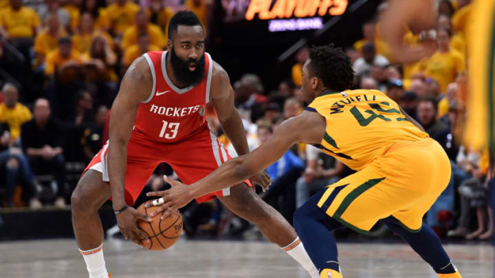 SALT LAKE CITY, UT - MAY 06: Donovan Mitchell #45 of the Utah Jazz knocks the ball from the hands of James Harden #13 of the Houston Rockets in the second half during Game Four of Round Two of the 2018 NBA Playoffs at Vivint Smart Home Arena on May 6, 2018 in Salt Lake City, Utah. The Rockets beat the Jazz 100-87. NOTE TO USER: User expressly acknowledges and agrees that, by downloading and or using this photograph, User is consenting to the terms and conditions of the Getty Images License Agreement. (Photo by Gene Sweeney Jr./Getty Images)