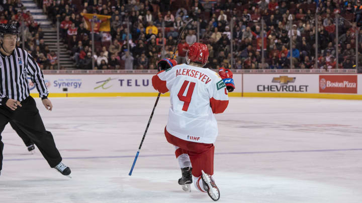 VANCOUVER, BC – DECEMBER 30: Alexander Alexeyev #4 of Russia celebrates after scoring a goal against Switzerland in Group A hockey action of the 2019 IIHF World Junior Championship action on December, 30, 2018 at Rogers Arena in Vancouver, British Columbia, Canada. (Photo by Rich Lam/Getty Images)