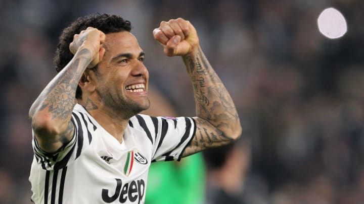 TURIN, ITALY - MARCH 14: Daniel Alves da Silva of Juventus FC celebrates a victory at the end of the UEFA Champions League Round of 16 second leg match between Juventus and FC Porto at Juventus Stadium on March 14, 2017 in Turin, Italy. (Photo by Marco Luzzani/Getty Images)