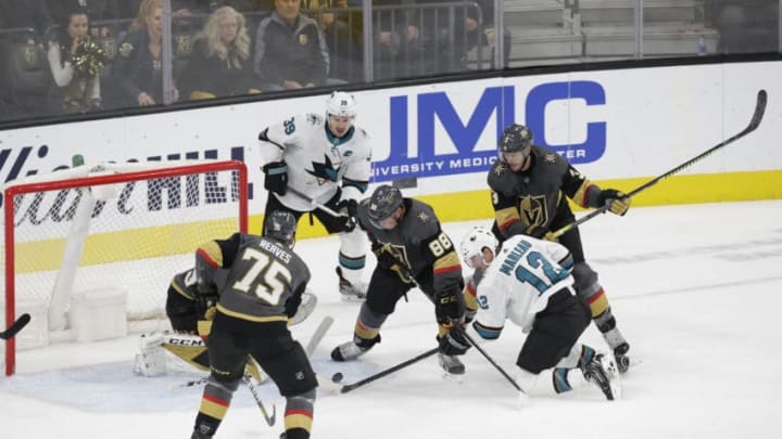 LAS VEGAS, NV - NOVEMBER 21: Vegas Golden Knights defenseman Nate Schmidt (88) and San Jose Sharks center Patrick Marleau (12) battle for control of the puck during a regular season game Thursday, Nov. 21, 2019, at T-Mobile Arena in Las Vegas, Nevada. (Photo by: Marc Sanchez/Icon Sportswire via Getty Images)