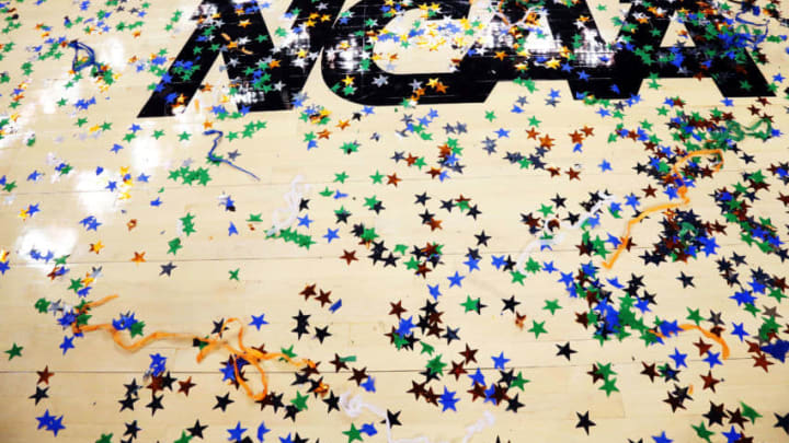 NEW ORLEANS, LA - APRIL 02: Confetti is seen on the NCAA logo after the Kentucky Wildcats defeat the Kansas Jayhawks 67-59 in the National Championship Game of the 2012 NCAA Division I Men's Basketball Tournament at the Mercedes-Benz Superdome on April 2, 2012 in New Orleans, Louisiana. (Photo by Ronald Martinez/Getty Images)