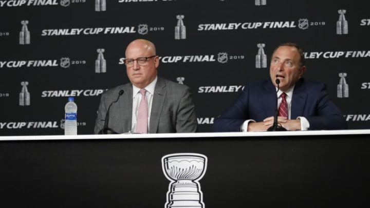 Deputy Commissioner Bill Daly III and Commissioner Gary Bettman (Photo by Fred Kfoury III/Icon Sportswire via Getty Images)