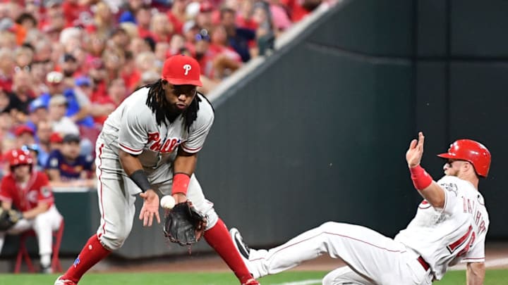 CINCINNATI, OH - JULY 27: Tucker Barnhart #16 of the Cincinnati Reds slides safely in to third base as Maikel Franco #7 of the Philadelphia Phillies takes the throw in the eighth inning at Great American Ball Park on July 27, 2018 in Cincinnati, Ohio. (Photo by Jamie Sabau/Getty Images)