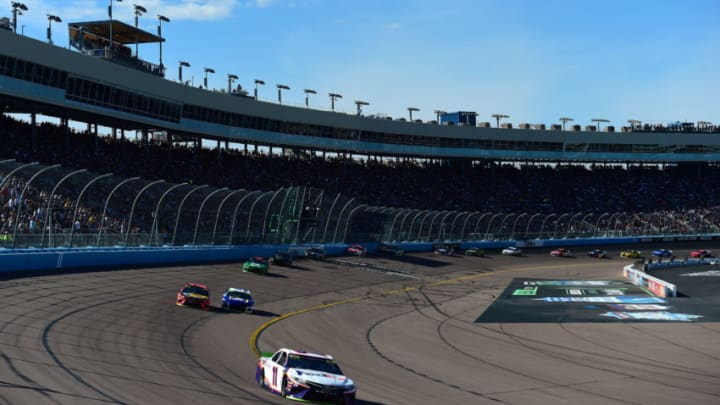 AVONDALE, ARIZONA - NOVEMBER 10: Denny Hamlin, driver of the #11 FedEx Ground Toyota, leads a pack of cars during the Monster Energy NASCAR Cup Series Bluegreen Vacations 500 at ISM Raceway on November 10, 2019 in Avondale, Arizona. (Photo by Jared C. Tilton/Getty Images)