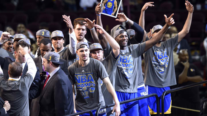 Jun 16, 2015; Cleveland, OH, USA; The Golden State Warriors celebrate after winning game six of the NBA Finals against the Cleveland Cavaliers at Quicken Loans Arena. Warriors won 105-97. Mandatory Credit: David Richard-USA TODAY Sports