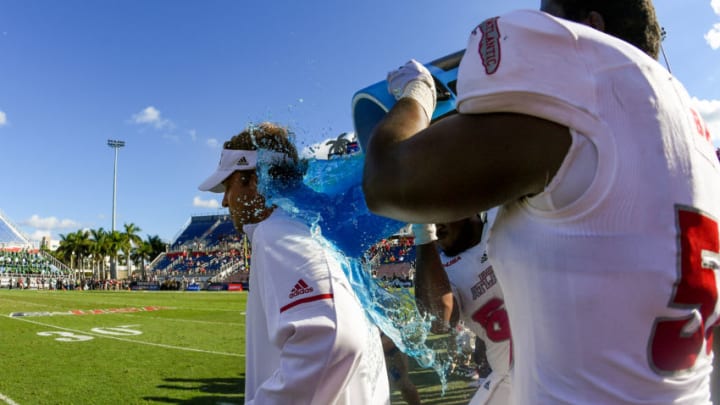 BOCA RATON, FL - DECEMBER 02: Head coach Lane Kiffin of the Florida Atlantic Owls gets dumped with Powerade during the fourth quarter of the Conference USA Championship game against the North Texas Mean Green at FAU Stadium on December 2, 2017 in Boca Raton, Florida. (Photo by Rob Foldy/Getty Images)