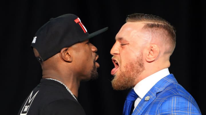 TORONTO, ON - JULY 12: Floyd Mayweather Jr. and Conor McGregor faceoff during the Floyd Mayweather Jr. v Conor McGregor World Press Tour at Budweiser Stage on July 12, 2017 in Toronto, Canada. (Photo by Vaughn Ridley/Getty Images)