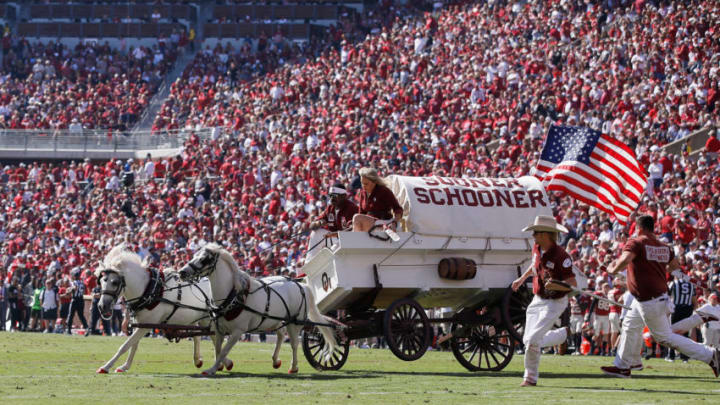 NORMAN, OK - OCTOBER 19: Oklahoma Ruf Nek's Sooner Schooner over turns after a touchdown celebration during a college football game between the Oklahoma Sooners and the West Virginia Mountaineers on October 19, 2019, at Memorial Stadium in Norman, OK. (Photo by David Stacy/Icon Sportswire via Getty Images)