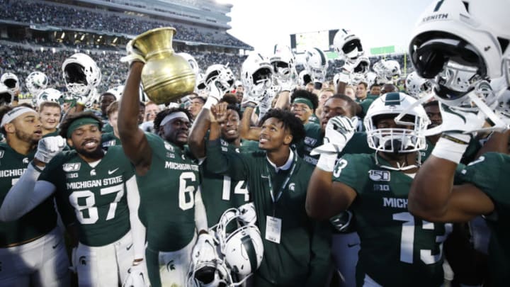 EAST LANSING, MI - SEPTEMBER 28: Michigan State Spartans players celebrate after a game against the Indiana Hoosiers at Spartan Stadium on September 28, 2019 in East Lansing, Michigan. Michigan State defeated Indiana 40-31. (Photo by Joe Robbins/Getty Images)