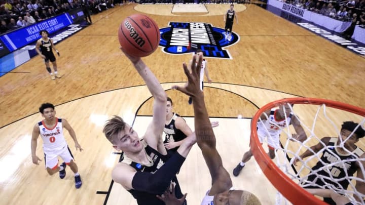 LOUISVILLE, KENTUCKY - MARCH 30: Matt Haarms #32 of the Purdue Boilermakers shoots over Mamadi Diakite #25 of the Virginia Cavaliers during overtime of the 2019 NCAA Men's Basketball Tournament South Regional at KFC YUM! Center on March 30, 2019 in Louisville, Kentucky. (Photo by Andy Lyons/Getty Images)