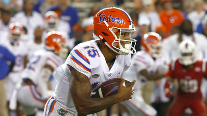 Florida Gators quarterback Anthony Richardson (15) runs the ball in for a touchdown during the fourth quarter against the Florida Atlantic Owls at Ben Hill Griffin Stadium. Mandatory Credit: Kim Klement-USA TODAY Sports