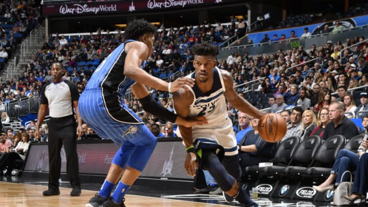 ORLANDO, FL - JANUARY 16: Jimmy Butler #23 of the Minnesota Timberwolves handles the ball against the Orlando Magic on January 16, 2018 at Amway Center in Orlando, Florida. NOTE TO USER: User expressly acknowledges and agrees that, by downloading and or using this photograph, User is consenting to the terms and conditions of the Getty Images License Agreement. Mandatory Copyright Notice: Copyright 2018 NBAE (Photo by Fernando Medina/NBAE via Getty Images)