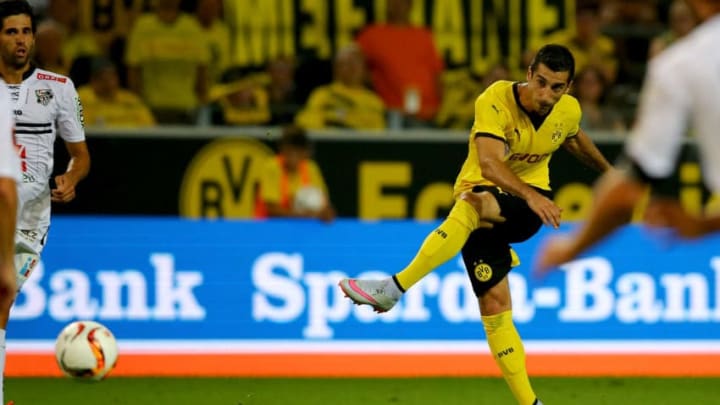 DORTMUND, GERMANY - AUGUST 06: Henrikh Mkhitaryan of Dortmund scores the thrid goal during the UEFA Europa League third Qualifying round 2nd leg match between Borussia Dortmund and Wolfsberg at Signal-Iduna-Park on August 6, 2015 in Dortmund, Germany. (Photo by Christof Koepsel/Bongarts/Getty Images)