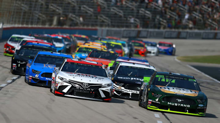 FORT WORTH, TEXAS - NOVEMBER 03: Kevin Harvick, driver of the #4 Busch Beer/Ducks Unlimited Ford, and Erik Jones, driver of the #20 Sport Clips Toyota, lead the field during the Monster Energy NASCAR Cup Series AAA Texas 500 at Texas Motor Speedway on November 03, 2019 in Fort Worth, Texas. (Photo by Sean Gardner/Getty Images)
