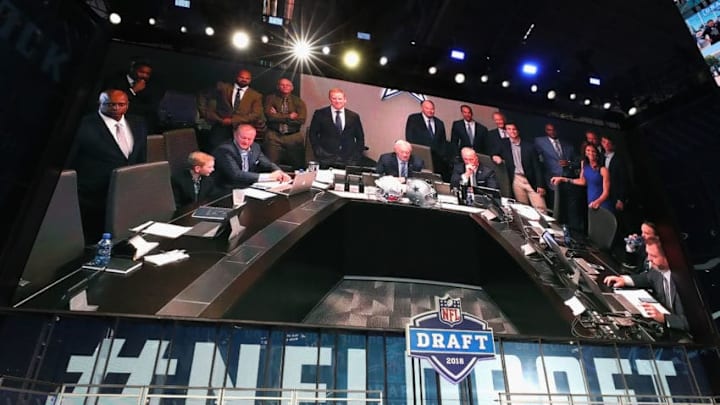 ARLINGTON, TX - APRIL 26: The Dallas Cowboys war room is seen on a video board during the first round of the 2018 NFL Draft at AT