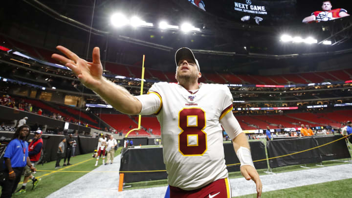 ATLANTA, GA – AUGUST 22: Quarterback Case Keenum #8 of the Washington Redskins throw his gloves to fans at the conclusion of an NFL preseason game against the Atlanta Falcons at Mercedes-Benz Stadium on August 22, 2019 in Atlanta, Georgia. (Photo by Todd Kirkland/Getty Images)