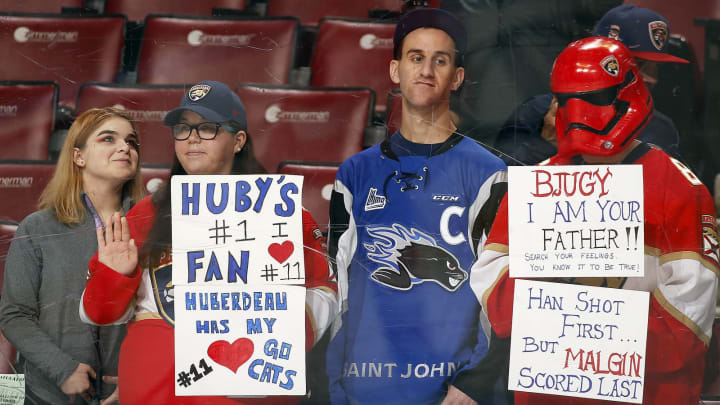SUNRISE, FL – DECEMBER 1: Fans of Jonathan Huberdeau #11 and Nick Bjugstad #27 of the Florida Panthers have message for them prior to the start of the game against the San Jose Sharks at the BB&T Center on December 1, 2017 in Sunrise, Florida. (Photo by Eliot J. Schechter/NHLI via Getty Images)