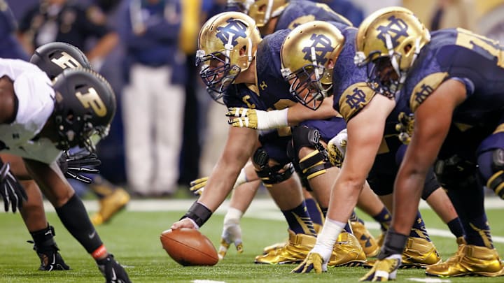 INDIANAPOLIS, IN – SEPTEMBER 13: Members of the Notre Dame Fighting Irish offensive line line up against the Purdue Boilermakers at Lucas Oil Stadium on September 13, 2014 in Indianapolis, Indiana. (Photo by Michael Hickey/Getty Images)