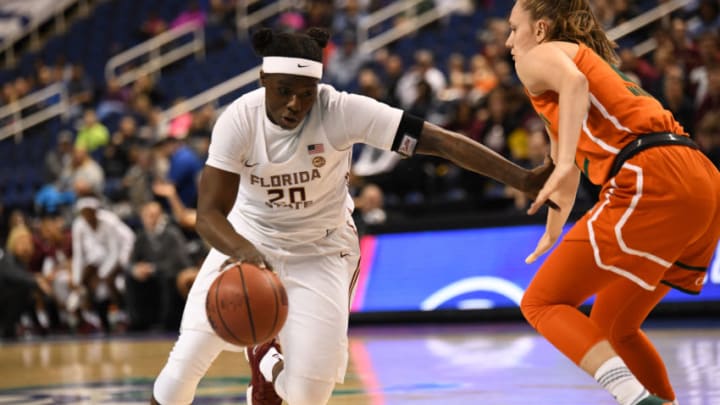 GREENSBORO, NC - MARCH 02: Florida State Seminoles forward Shakayla Thomas (20) drives during the ACC women's tournament game between the Miami Hurricanes and the Florida State Seminoles on March 2, 2018, at Greensboro Coliseum Complex in Greensboro, NC. (Photo by William Howard/Icon Sportswire via Getty Images)
