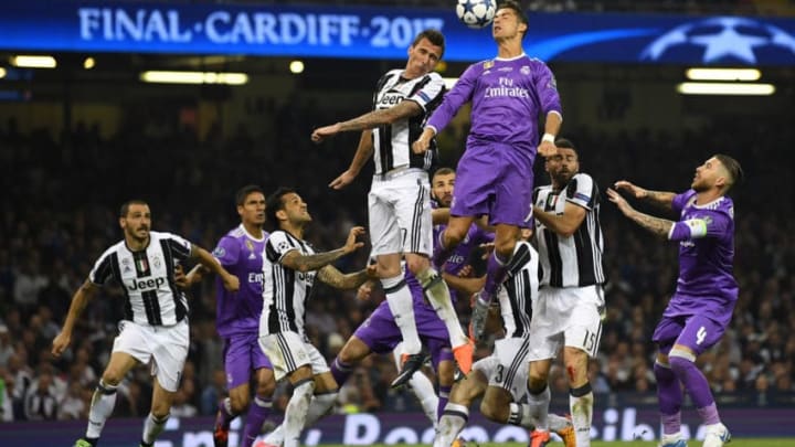 CARDIFF, WALES - JUNE 03: Cristiano Ronaldo of Real Madrid rises to meet a corner during the UEFA Champions League Final between Juventus and Real Madrid at National Stadium of Wales on June 3, 2017 in Cardiff, Wales. (Photo by Laurence Griffiths/Getty Images)