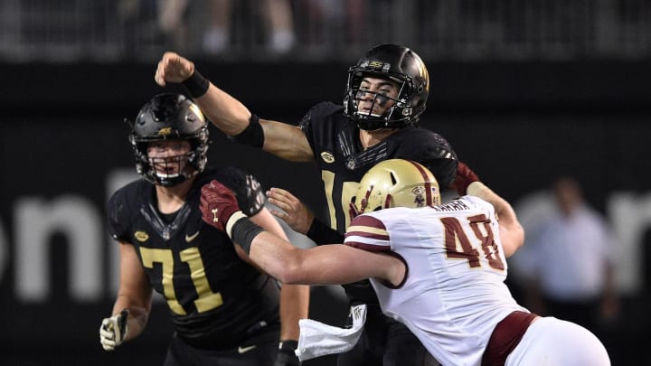 WINSTON SALEM, NC – SEPTEMBER 13: Tanner Karafa #48 of the Boston College Eagles pressures Sam Hartman #10 of the Wake Forest Demon Deacons during their game at BB&T Field on September 13, 2018 in Winston Salem, North Carolina. (Photo by Grant Halverson/Getty Images)