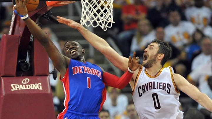 Apr 17, 2016; Cleveland, OH, USA; Cleveland Cavaliers forward Kevin Love (0) defends the shot of Detroit Pistons guard Reggie Jackson (1) during the fourth quarter in game one of the first round of the NBA Playoffs at Quicken Loans Arena. The Cavs beat the Pistons 106-101. Mandatory Credit: Ken Blaze-USA TODAY Sports