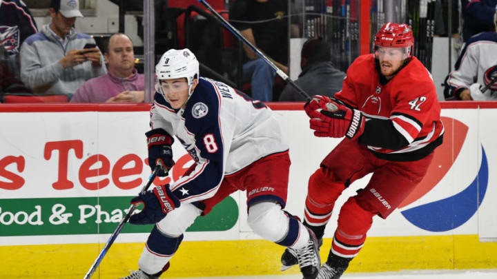 RALEIGH, NC - OCTOBER 10: Columbus Blue Jackets Defenceman Zach Werenski (8) skates past Carolina Hurricanes Left Wing Joakim Nordstrom (42) in a game between the Columbus Blue Jackets and the Carolina Hurricanes at the PNC Arena in Raleigh, NC on October 10, 2017. Columbus defeated Carolina 2 - 1 in overtime. (Photo by Greg Thompson/Icon Sportswire via Getty Images)