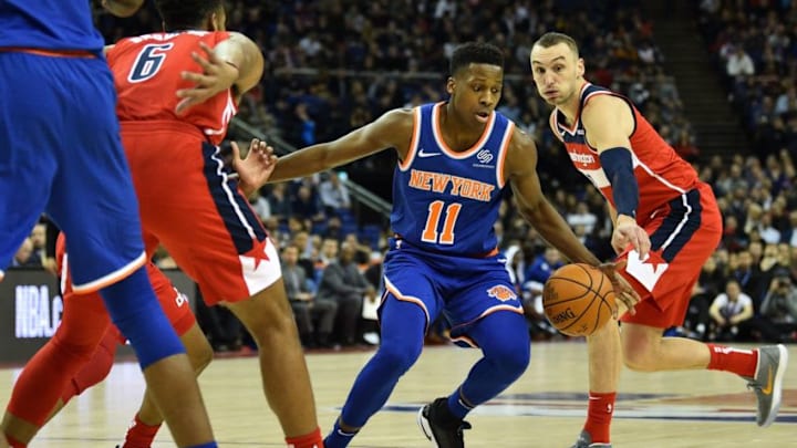 New York Knicks' Frank Ntilikina (C) dribbles during the NBA London Game 2019 basketball game between Washington Wizards and New York Knicks at the O2 Arena in London on January 17, 2019. (Photo by Glyn KIRK / AFP) (Photo credit should read GLYN KIRK/AFP/Getty Images)