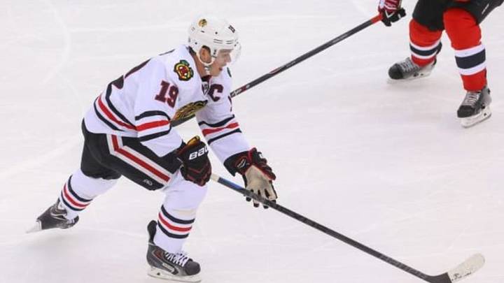 Dec 9, 2014; Newark, NJ, USA; Chicago Blackhawks center Jonathan Toews (19) skates with the puck during the third period at Prudential Center. The Blackhawks defeated the Devils 3-2 in a shootout. Mandatory Credit: Ed Mulholland-USA TODAY Sports