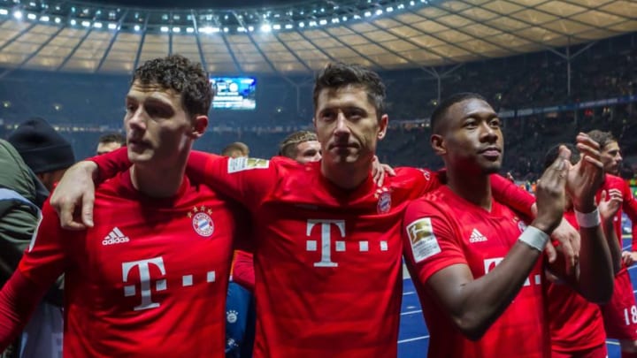 BERLIN, GERMANY - JANUARY 19: (BILD ZEITUNG OUT) Benjamin Pavard of FC Bayern Muenchen, Robert Lewandowski of FC Bayern Muenchen and David Alaba of FC Bayern Muenchen looks on during the Bundesliga match between Hertha BSC and FC Bayern Muenchen at Olympiastadion on January 19, 2020 in Berlin, Germany. (Photo by TF-Images/Getty Images)