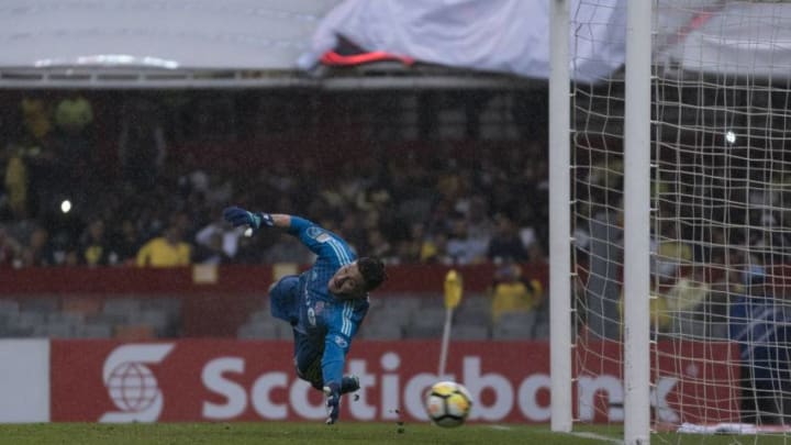 MEXICO CITY, MEXICO - APRIL 10: Alex Bono goalkeeper of Toronto dives for the ball during the semifinal second leg match between America and Toronto at Azteca Stadium on April 10, 2018 in Mexico City, Mexico. (Photo by Luis Licona/Getty Images)