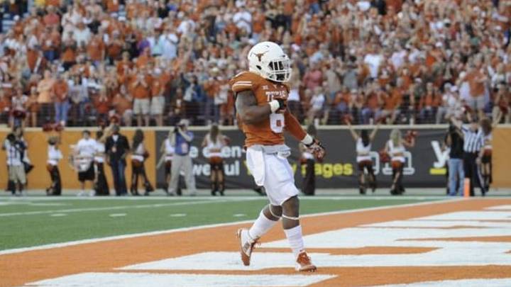 Nov 8, 2014; Austin, TX, USA; Texas Longhorns corner back Quandre Diggs (6) reacts against the West Virginia Mountaineers during the second half at Darrell K Royal-Texas Memorial Stadium. Texas beat West Virginia 33-16. Mandatory Credit: Brendan Maloney-USA TODAY Sports