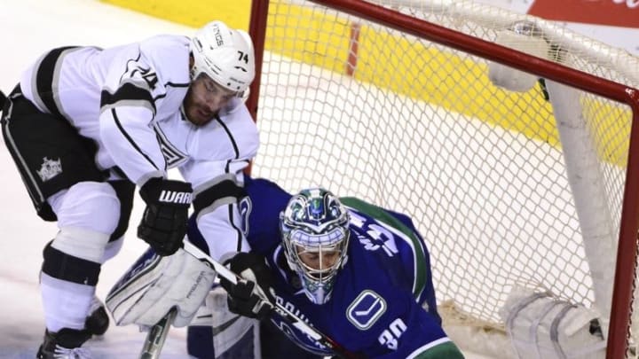 Apr 4, 2016; Vancouver, British Columbia, CAN; Vancouver Canucks goaltender Ryan Miller (30) defends against Los Angeles Kings forward 