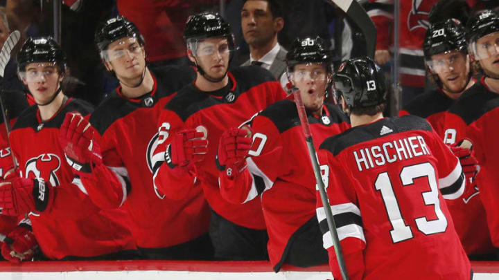 NEWARK, NJ - DECEMBER 27: Nico Hischier #13 of the New Jersey Devils is congratulated after scoring a goal against and the Toronto Maple Leafs during the game at the Prudential Center on December 27, 2019 in Newark, New Jersey. (Photo by Andy Marlin/NHLI via Getty Images)