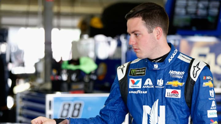 LOUDON, NH - JULY 21: Alex Bowman, driver of the #88 Nationwide Chevrolet, stands in the garage area during practice for the Monster Energy NASCAR Cup Series Foxwoods Resort Casino 301 at New Hampshire Motor Speedway on July 21, 2018 in Loudon, New Hampshire. (Photo by Brian Lawdermilk/Getty Images)