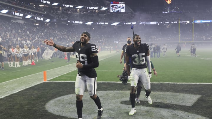 LAS VEGAS, NEVADA - JANUARY 09: Cornerbacks Casey Hayward Jr. #29 and Brandon Facyson #35 of the Las Vegas Raiders celebrate as they run off the field after the team's 35-32 overtime victory over the Los Angeles Chargers at Allegiant Stadium on January 9, 2022 in Las Vegas, Nevada. (Photo by Ethan Miller/Getty Images)