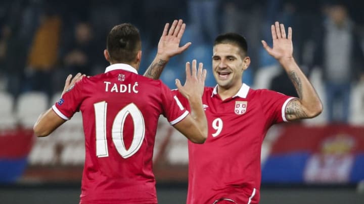 BELGRADE, SERBIA - OCTOBER 09: Aleksandar Mitrovic (R) celebrate scoring a goal with the Dusan Tadic (L) of Serbia during the FIFA 2018 World Cup Qualifier between Serbia and Austria at stadium Rajko Mitic on October 9, 2016 in Belgrade, . (Photo by Srdjan Stevanovic/Getty Images)