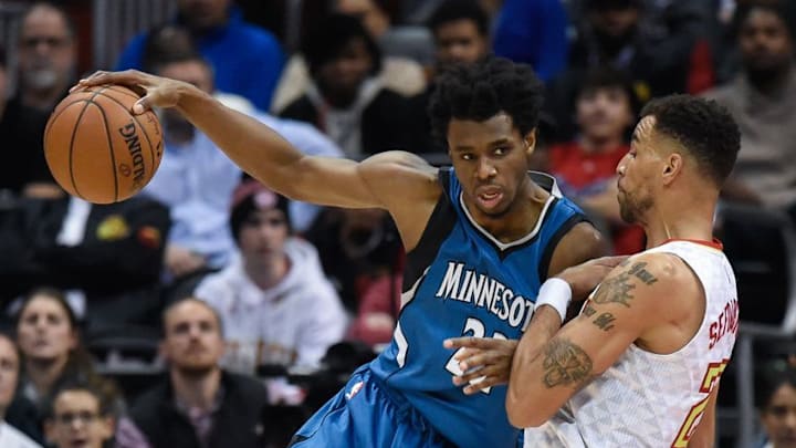 Dec 21, 2016; Atlanta, GA, USA; Minnesota Timberwolves forward Andrew Wiggins (22) works against the defense of Atlanta Hawks forward Thabo Sefolosha (25) during the second half at Philips Arena. The Timberwolves defeated the Hawks 92-84. Mandatory Credit: Dale Zanine-USA TODAY Sports