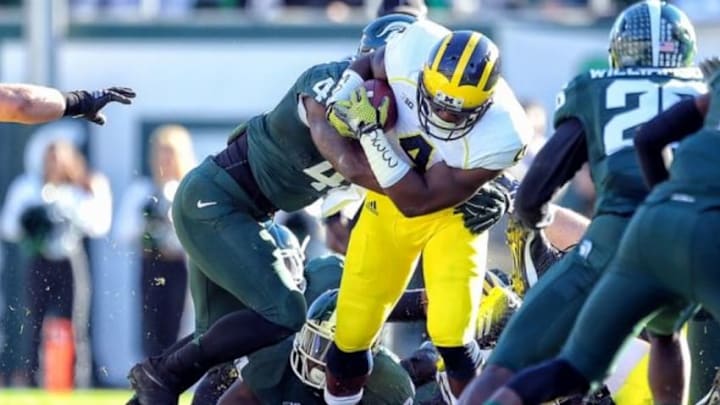 The Michigan State Spartans crushed the rival Michigan Wolverines 35-11 on Saturday afternoon in a college football rivalry that has been very one-sided as of late Mandatory Credit: Mike Carter-USA TODAY Sports
