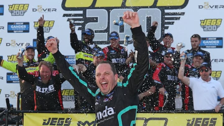 DOVER, DE - MAY 03: Johnny Sauter, NASCAR Truck Series driver of the #13 Tenda Heal ThorSport Racing Ford, celebrates after winning the 2019 JEGS 200 at Dover International Speedway (Photo by Matt Sullivan/Getty Images) DOVER, DE - MAY 03: Johnny Sauter, NASCAR Truck Series driver of the #13 Tenda Heal ThorSport Racing Ford, celebrates after winning the 2019 JEGS 200 at Dover International Speedway (Photo by Matt Sullivan/Getty Images)