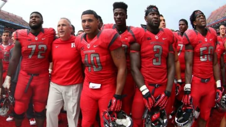 Sep 6, 2014; Piscataway, NJ, USA; Rutgers Scarlet Knights head coach Kyle Flood celebrates their 38-25 victory over the Howard Bison with his players at High Points Solutions Stadium. Mandatory Credit: Ed Mulholland-USA TODAY Sports Sep 6, 2014; Piscataway, NJ, USA; Rutgers Scarlet Knights head coach Kyle Flood celebrates their 38-25 victory over the Howard Bison with his players at High Points Solutions Stadium. Mandatory Credit: Ed Mulholland-USA TODAY Sports