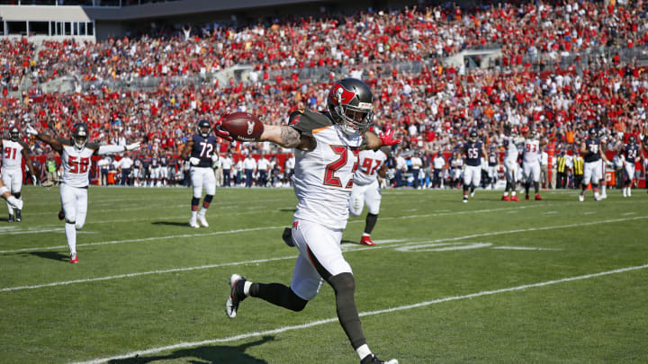 TAMPA, FL – NOVEMBER 13: Chris Conte #23 of the Tampa Bay Buccaneers returns an interception 20 yards for a touchdown against the Chicago Bears in the first quarter of the game at Raymond James Stadium on November 13, 2016 in Tampa, Florida. (Photo by Joe Robbins/Getty Images)