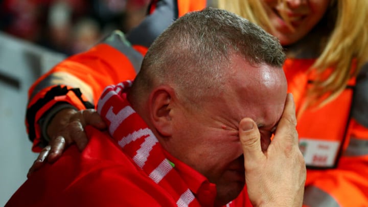 A tearful fan of Liverpool (Photo by Robbie Jay Barratt - AMA/Getty Images)