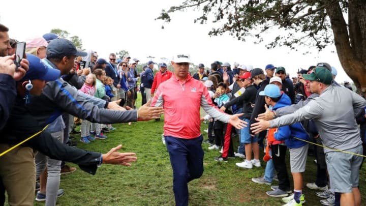 PEBBLE BEACH, CALIFORNIA - JUNE 16: Gary Woodland of the United States greets fans as he walks off the 14th hole during the final round of the 2019 U.S. Open at Pebble Beach Golf Links on June 16, 2019 in Pebble Beach, California. (Photo by Warren Little/Getty Images)