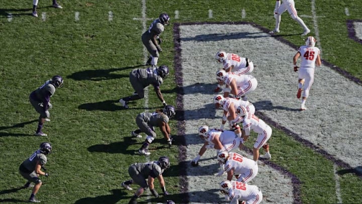 EVANSTON, IL - NOVEMBER 05: The offense for the Wisconsin Badgers prepares to take on the defense of the Northwestern Wildcats at Ryan Field on November 5, 2016 in Evanston, Illinois. (Photo by Jonathan Daniel/Getty Images)
