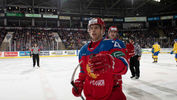KELOWNA, BC - DECEMBER 18: Grigory Denisenko #28 and Alexander Romanov #26 of Team Russia celebrate a first period goal against the Team Sweden at Prospera Place on December 18, 2018 in Kelowna, Canada. (Photo by Marissa Baecker/Getty Images)